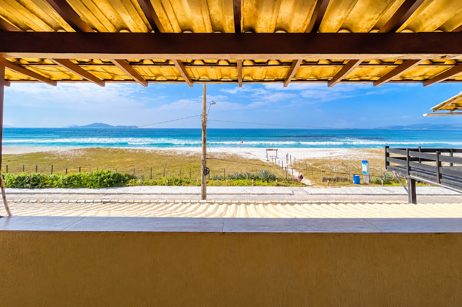 Varanda do Familiar com Vista Mar com vista aberta para a praia do Foguete